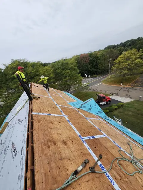 JR General Constructions crew installing a roof